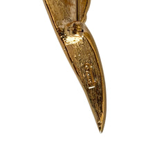 Vintage Monet gold tone brooch with pave rhinestones in a stylized floral umbel design.