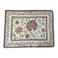 Provence Jacquard Montespan Collection placemat from Tissus Toselli, featuring a pink floral design on a cream-colored background, woven with intricate patterns inspired by old Provencal fabrics, measuring 19" x 15", photographed showcasing its elegant and refined craftsmanship