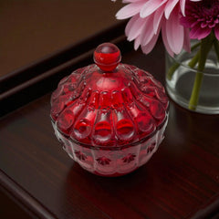 Vintage Moon and Stars ruby red glass candy dish with scalloped bowl and matching lid, featuring embossed celestial motifs and rich translucent color.