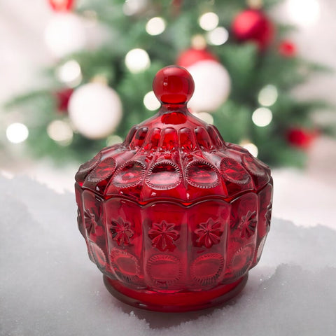 Vintage Moon and Stars ruby red glass candy dish with scalloped bowl and matching lid, featuring embossed celestial motifs and rich translucent color.