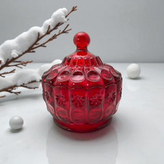 Vintage Moon and Stars ruby red glass candy dish with scalloped bowl and matching lid, featuring embossed celestial motifs and rich translucent color.
