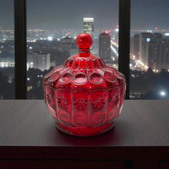 Vintage Moon and Stars ruby red glass candy dish with scalloped bowl and matching lid, featuring embossed celestial motifs and rich translucent color.