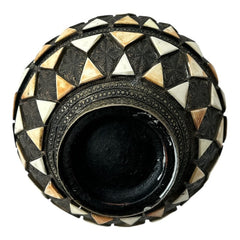Vintage Moroccan pottery vase from the 1970s/80s, featuring a large clay body with ornate metal inlays, an antiqued bronze/brass finish, and three geometric rings of camel bone triangle patterns. Includes an original metal lid, reflecting its historic use for storing and transporting liquids. In very good vintage condition, showcasing intricate craftsmanship and cultural heritage.