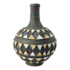 Vintage Moroccan pottery vase from the 1970s/80s, featuring a large clay body with ornate metal inlays, an antiqued bronze/brass finish, and three geometric rings of camel bone triangle patterns. Includes an original metal lid, reflecting its historic use for storing and transporting liquids. In very good vintage condition, showcasing intricate craftsmanship and cultural heritage.