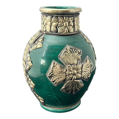 Vintage Moroccan small vase from the 1970s or 1980s, featuring a green glaze with ornate metal overlay in floral and geometric patterns, very good condition.