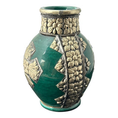 Vintage Moroccan small vase from the 1970s or 1980s, featuring a green glaze with ornate metal overlay in floral and geometric patterns, very good condition.