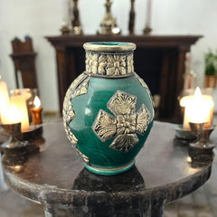 Vintage Moroccan small vase from the 1970s or 1980s, featuring a green glaze with ornate metal overlay in floral and geometric patterns, very good condition.