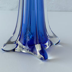 Vintage cobalt blue and clear glass vase with sculptural pulled base and triangular rim, shown from multiple angles.