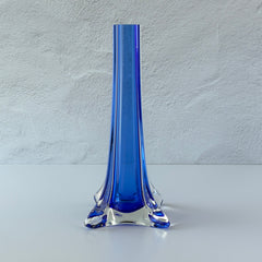 Vintage cobalt blue and clear glass vase with sculptural pulled base and triangular rim, shown from multiple angles.