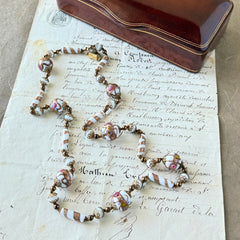 Vintage Venetian Murano glass long necklace with white Fiorato wedding cake beads and copper foil swirl cylinders. Hand‑knotted, 1950s craftsmanship, exquisite detail, and timeless Venetian artistry.