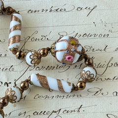 Vintage Venetian Murano glass long necklace with white Fiorato wedding cake beads and copper foil swirl cylinders. Hand‑knotted, 1950s craftsmanship, exquisite detail, and timeless Venetian artistry.