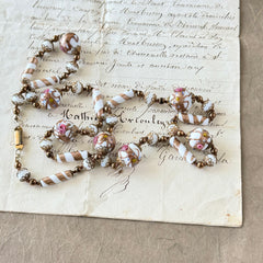 Vintage Venetian Murano glass long necklace with white Fiorato wedding cake beads and copper foil swirl cylinders. Hand‑knotted, 1950s craftsmanship, exquisite detail, and timeless Venetian artistry.
