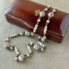 Vintage Venetian Murano glass long necklace with white Fiorato wedding cake beads and copper foil swirl cylinders. Hand‑knotted, 1950s craftsmanship, exquisite detail, and timeless Venetian artistry.