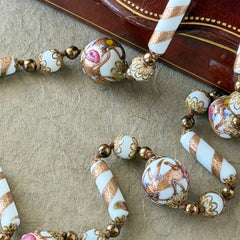 Vintage Venetian Murano glass long necklace with white Fiorato wedding cake beads and copper foil swirl cylinders. Hand‑knotted, 1950s craftsmanship, exquisite detail, and timeless Venetian artistry.
