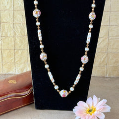 Vintage Venetian Murano glass long necklace with white Fiorato wedding cake beads and copper foil swirl cylinders. Hand‑knotted, 1950s craftsmanship, exquisite detail, and timeless Venetian artistry.