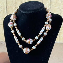 Vintage Venetian Murano glass long necklace with white Fiorato wedding cake beads and copper foil swirl cylinders. Hand‑knotted, 1950s craftsmanship, exquisite detail, and timeless Venetian artistry.