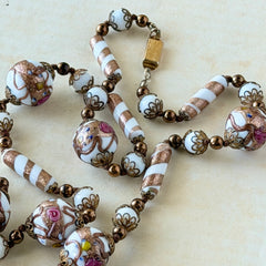 Vintage Venetian Murano glass long necklace with white Fiorato wedding cake beads and copper foil swirl cylinders. Hand‑knotted, 1950s craftsmanship, exquisite detail, and timeless Venetian artistry.