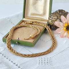 Vintage Napier 1995 Legacy Collection gold‑plated braided foxtail chain necklace with signed oval hangtag and lobster clasp.