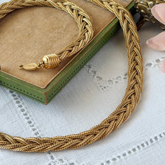 Vintage Napier 1995 Legacy Collection gold‑plated braided foxtail chain necklace with signed oval hangtag and lobster clasp.