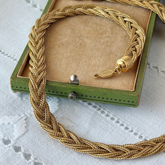 Vintage Napier 1995 Legacy Collection gold‑plated braided foxtail chain necklace with signed oval hangtag and lobster clasp.