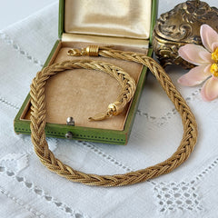 Vintage Napier 1995 Legacy Collection gold‑plated braided foxtail chain necklace with signed oval hangtag and lobster clasp.