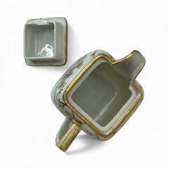 Antique Nippon Morimura Brothers square porcelain creamer with lid, hand-painted pink roses, gold moriage accents, and faded green maker’s mark on base.