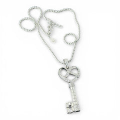 Vintage Nolan Miller silver-tone key pendant necklace with clear rhinestones in heart and infinity design, shown on twisted rope chain.