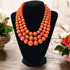 Vintage Orange Moonglow Lucite 3-Strand Necklace (1950s)