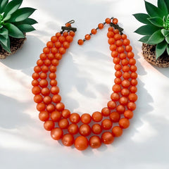 Vintage Orange Moonglow Lucite 3-Strand Necklace (1950s)