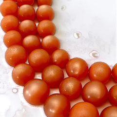 Vintage Orange Moonglow Lucite 3-Strand Necklace (1950s)
