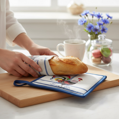 French oven mitt with printed rooster and Eiffel Tower design, blue stripes, and 'French Cocorico' text on eco-friendly fabric.