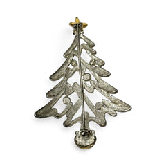 Vintage Paquette Christmas tree brooch in silver and gold-tone metal, featuring a modernist design with circular cutouts and a gold star at the top; signed on the back, circa 1990s, in very good condition.