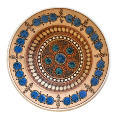Rare vintage French studio pottery bowl by Paul Dordet, featuring textured buff and terracotta clay with blue and white glazed circles in an orientalist pattern; signed on the underside and suitable for display flat or wall-hung.