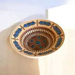 Rare vintage French studio pottery bowl by Paul Dordet, featuring textured buff and terracotta clay with blue and white glazed circles in an orientalist pattern; signed on the underside and suitable for display flat or wall-hung.