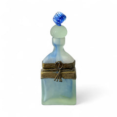 Vintage Romanian art glass perfume bottle from the 1990s, featuring frosted blue and green glass with a sculptural swirled stopper and bronze wire bow detail around the neck. Square base with a tapered neck; dauber slightly shortened due to breakage.