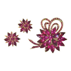 Vintage Weiss fuchsia rhinestone floral brooch and matching clip‑on earrings in light gold tone with layered petal design.