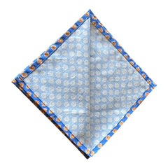 Provence cotton napkins featuring a blue background with light brown floral designs from the Le Cluny Olives Mimosa French Country Collection, made of 100% cotton, measuring 18" x 18", with vibrant, fade-resistant prints.