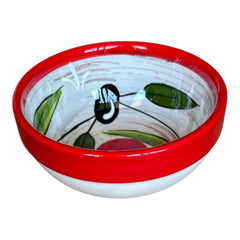 Mini ceramic bowl with red rim and white base, hand-painted with black olives and green leaves; measures 3¾ inches in diameter and 1¾ inches high, ideal for condiments or small servings.
