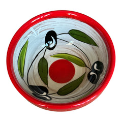 Mini ceramic bowl with red rim and white base, hand-painted with black olives and green leaves; measures 3¾ inches in diameter and 1¾ inches high, ideal for condiments or small servings.