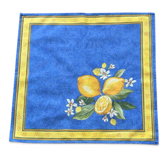 Provence cotton napkins in blue with yellow lemon motif, green leaves, and delicate lemon blossoms.