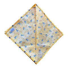 Provence cotton napkins featuring a yellow background with blue and yellow floral designs from Marat d’Avignon Tradition Collection, made of 100% cotton, measuring 18" x 18", with vibrant, fade-resistant prints. Made in France.