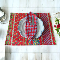 Provence cotton napkins featuring a red background with blue floral designs from the Le Cluny Olives Mimosa French Country Collection, made of 100% cotton, measuring 18" x 18", photographed in excellent condition with vibrant, fade-resistant prints.