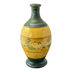 Handmade ceramic oil bottle or vase from Provence, featuring a yellow glaze with green accents and hand-painted white floral motif, signed Bleu d’Argile France