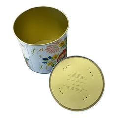 Round cookie tin box in Quimper designs, available in Floral or Rooster patterns. Cylindrical tin with a moisture-absorbing lid for keeping cookies fresh. Perfect for adding a French country charm to your kitchen.