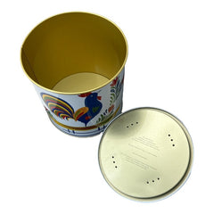 Round cookie tin box in Quimper designs, available in Floral or Rooster patterns. Cylindrical tin with a moisture-absorbing lid for keeping cookies fresh. Perfect for adding a French country charm to your kitchen.