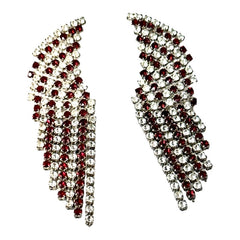 Vintage 1980s sparkly earrings with red and clear prong-set rhinestones, silver tone metal, waterfall drop design, and posts for pierced ears. High-quality craftsmanship with an elegant and glamorous look, perfect for special events and evening wear.