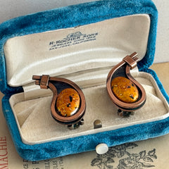 Vintage Matisse Renoir copper clip‑on earrings with orange sugar‑textured art‑glass cabochons.