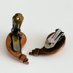 Vintage Matisse Renoir copper clip‑on earrings with orange sugar‑textured art‑glass cabochons.