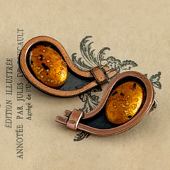Vintage Matisse Renoir copper clip‑on earrings with orange sugar‑textured art‑glass cabochons.