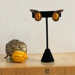 Vintage Matisse Renoir copper clip‑on earrings with orange sugar‑textured art‑glass cabochons.